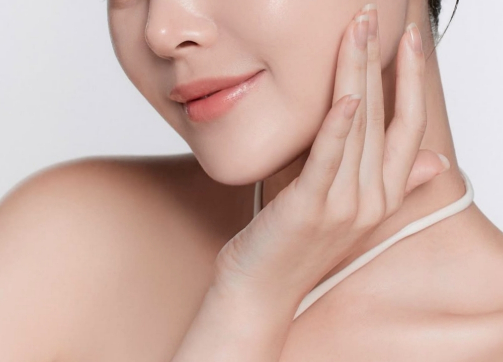 Woman with smooth skin and defined jawline after professional aesthetic filler treatment