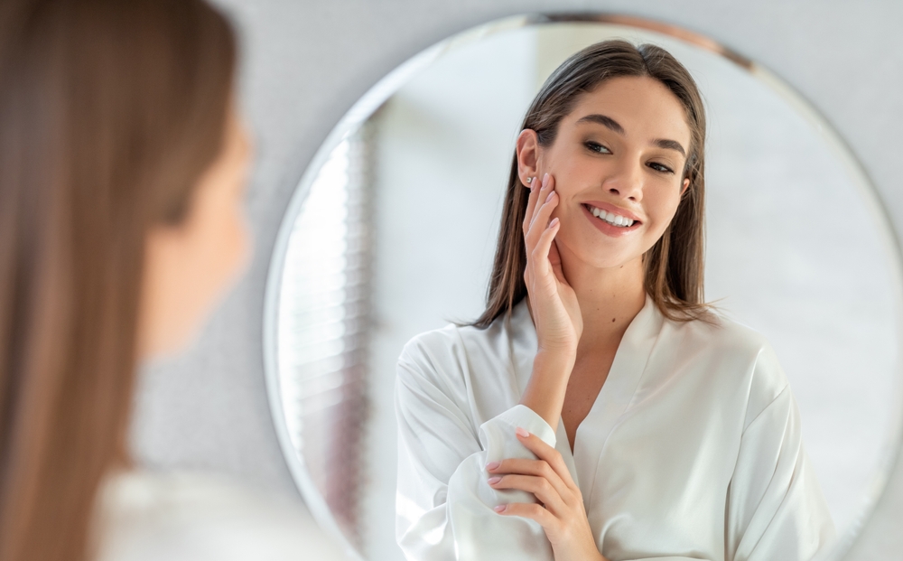 Women checking whether their skin needs a skin booster