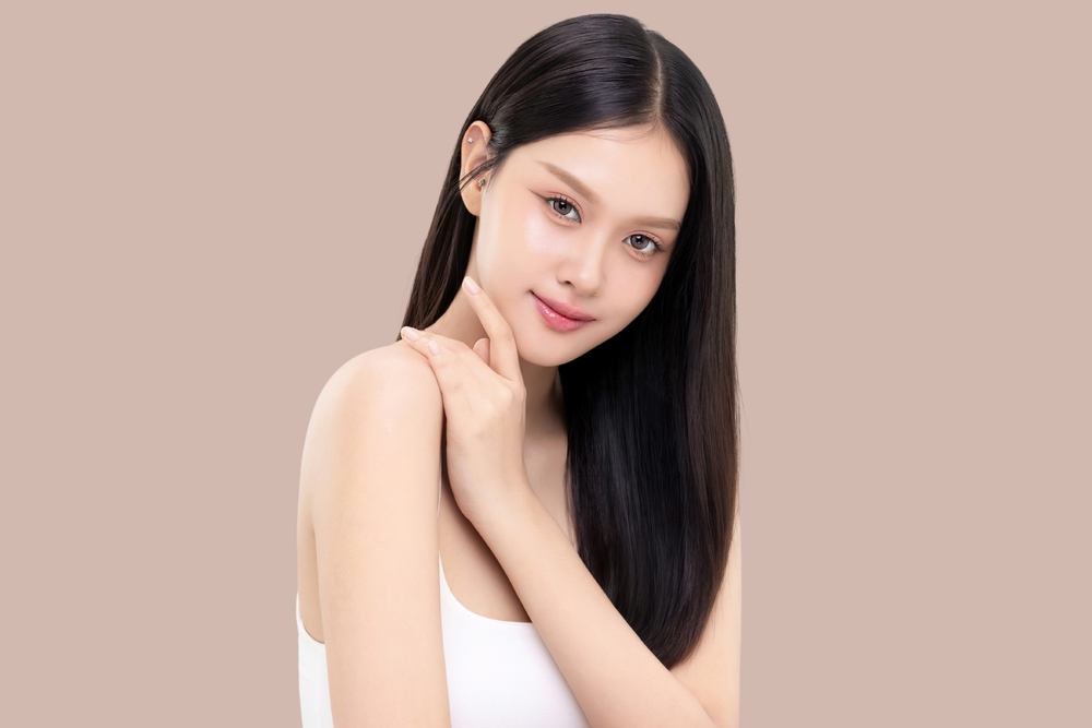 Woman illustrating balanced facial aesthetics achieved through personalized treatment planning