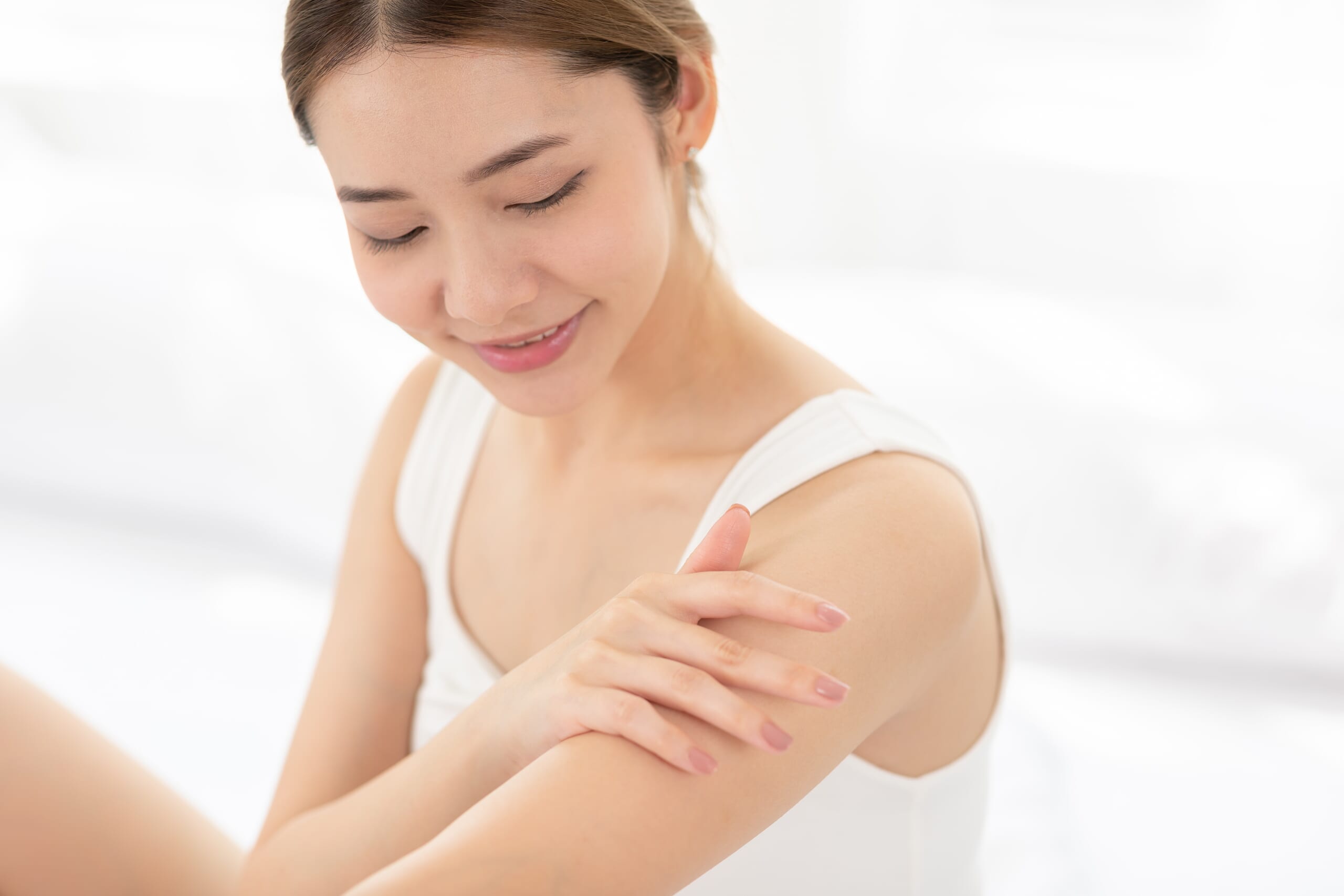 Woman receiving full body skin care