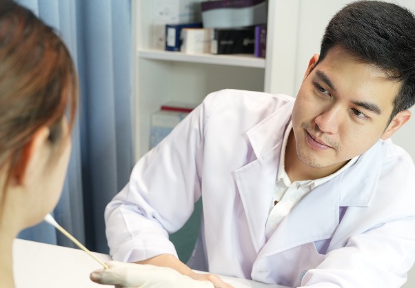 Bibi Clinic doctor answering questions about the best laser hair removal in Bangkok